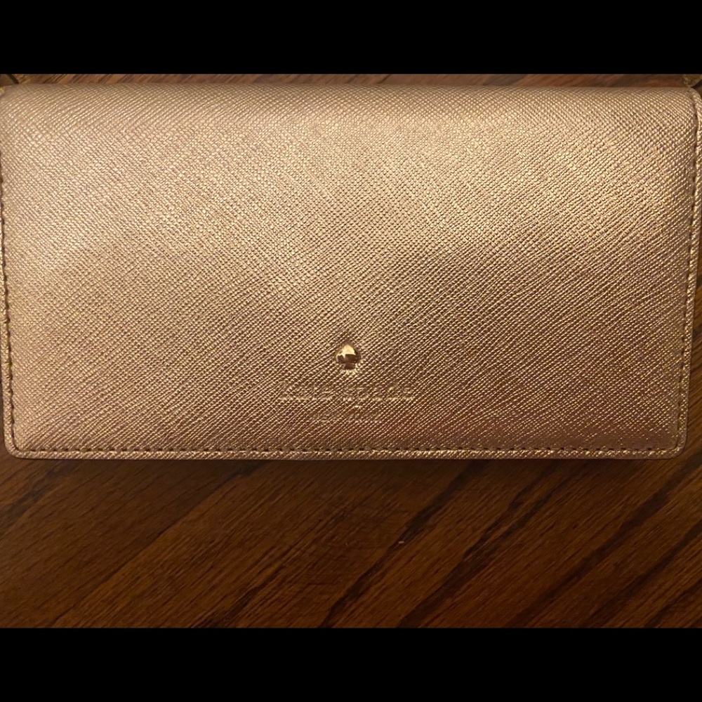 Kate Spade ultra thin cross body purse in gold